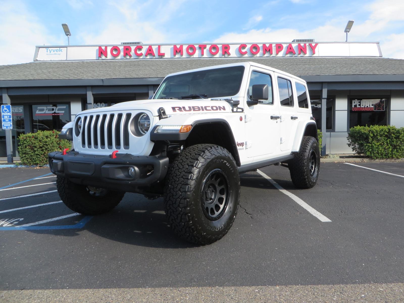 2021 White /BLACK Jeep Wrangler Unlimited Rubicon (1C4HJXFN6MW) with an 2.0L L4 DOHC 16V TURBO engine, automatic transmission, located at 2630 Grass Valley Highway, Auburn, CA, 95603, (530) 508-5100, 38.937893, -121.095482 - Photo #0